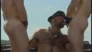 Hairy leather threesome fucking outdoor