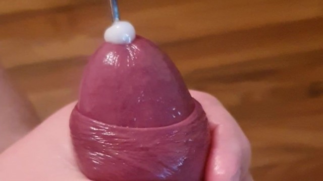 Big cock cumming with a 10 inch rosebud sound inside