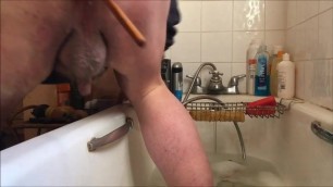 Anal gapes in bath with a peeled banana