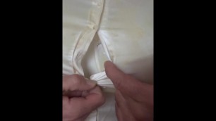 satin blouse and bra stained with cum
