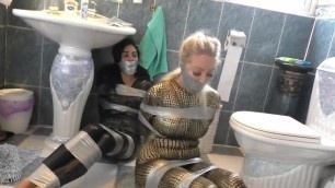 Two Girls in Catsuit Duct Taped and Gagged